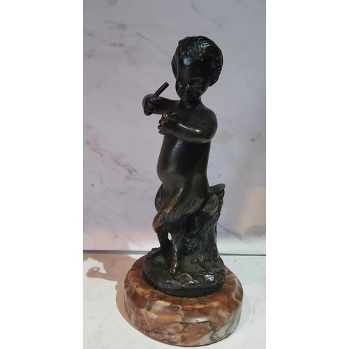 104 - After Clodion, a dark patinated bronze, Young Satyr, signed, 16cm high