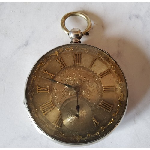 212 - A Victorian silver open faced pocket watch, foliate engraved silver dial, Roman numerals, c.1850
