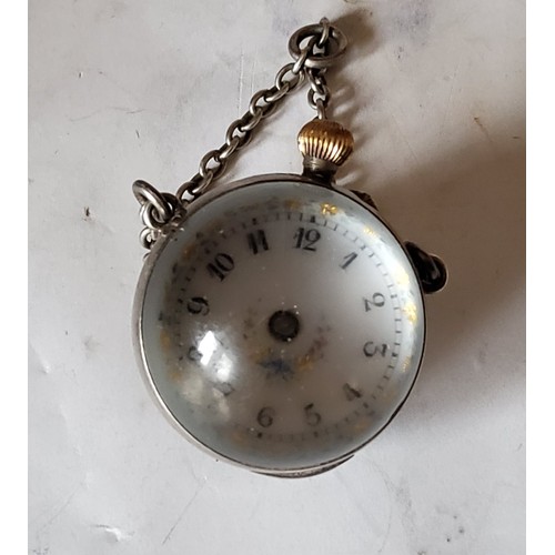 215 - A Victorian globular chatelaine watch, Arabic numerals, suspension chain, 3cm diam, c.1870