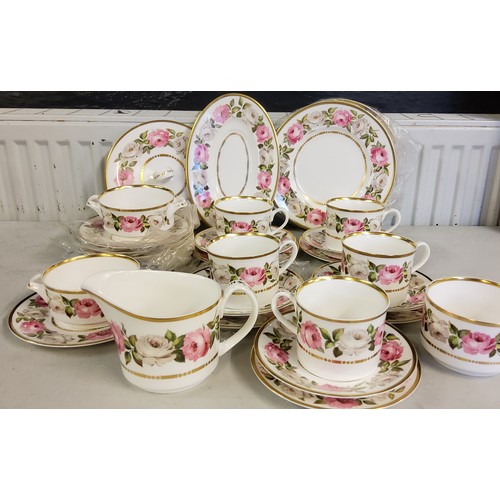 335 - A Royal Worcester Royal Garden pattern tea service,  comprising five cups, saucers, side plates... 