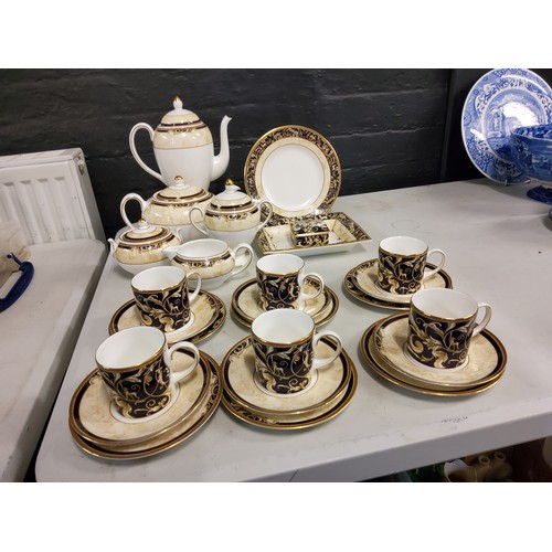 349 - A set of six Wedgwood Cornucopia coffee cans, saucers and and side plates, coffee pot, sugar bowl, m... 