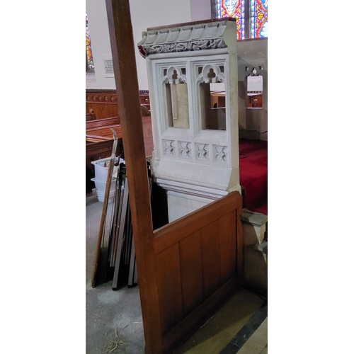 2 - A Victorian carved oak ecclesiastical rood screen with three open archways leading to the chancel an... 