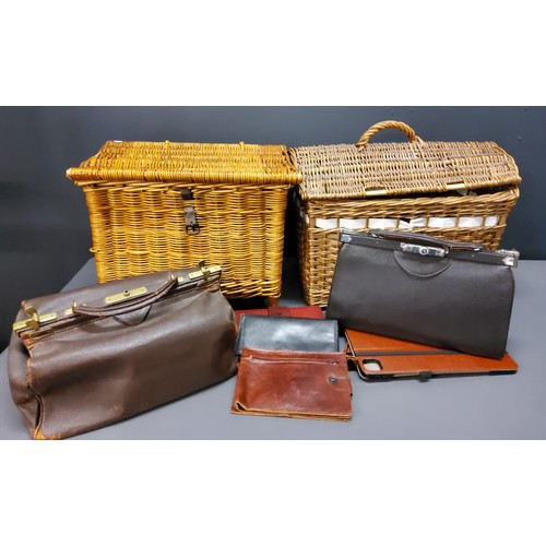 360 - A wicker basket;  another;   a Finnigans leather bag;  leather purses;  etc