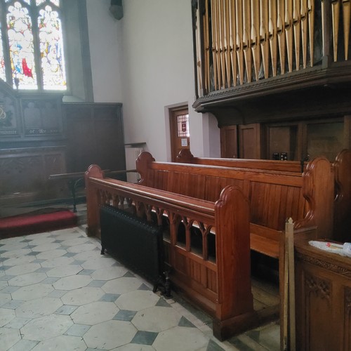 4 - The right hand Victorian pitch pine choir stall from Dore Church, including pierced fretwork hymn st... 