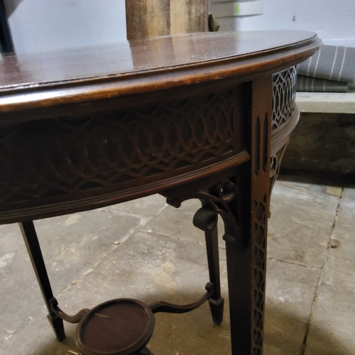 5E - A 20th century golden oak priest's chair; A Victorian Gothic revival circular hall table (2) Importa... 