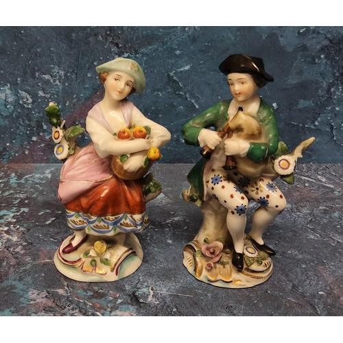 80A - A  pair of Continental porcelain figure, of a Musician and Companion, he with a set of bagpipes... 