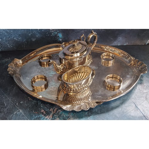 71 - A Walker and Hall three piece hall fluted bachelor's tea service, shaped ova tray ensuite, with four... 