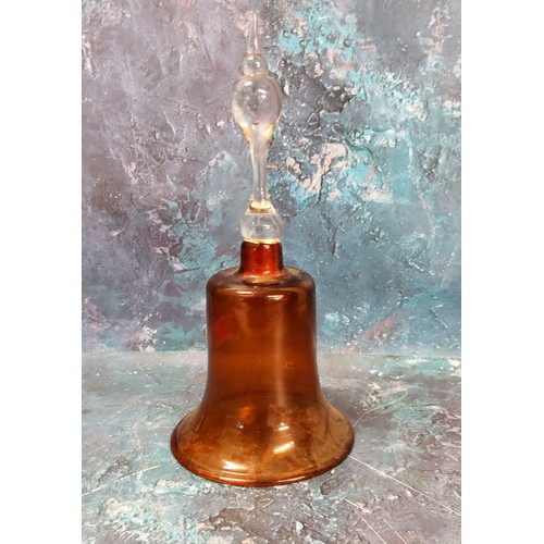 25 - A Victorian cranberry glass bell, clear handle, with clanger, 32cm high, c.1880