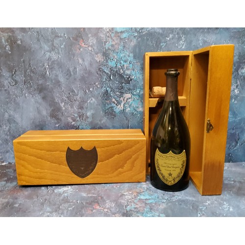 76 - Two Cuvee Dom Perignon Vintage wooden cases;  two empty  bottles of Cuvee Dom Perigno... 