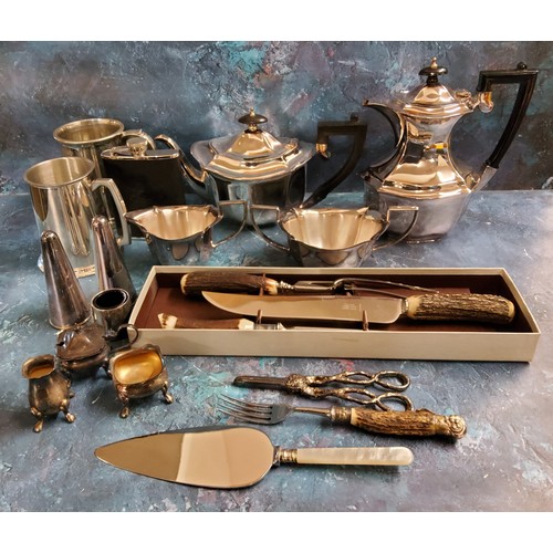 99 - Plate Ware - an E.P.N.S.  four piece tea service;  cruet sets;  horn hafted carving s... 