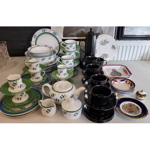 116 - A Patra dinner, coffee and tea service, decorated with blue flowers;  a retro style black coffe... 