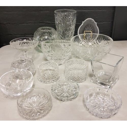 134 - Glassware - a heavy cut glass vase;  others;  bowls;  tray;  etc