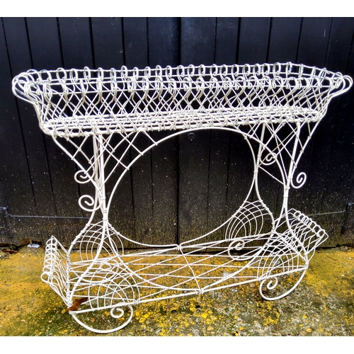 499 - An ornate 20th century metal plant stand, painted white