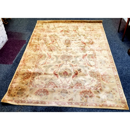 503 - A large 20th century Persian Ziegler style wool pile carpet in tones of gold and terracotta