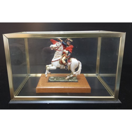 151 - A handpainted die-cast figure of Napoleon on horseback based on the painting by Jacques-Louis David,... 