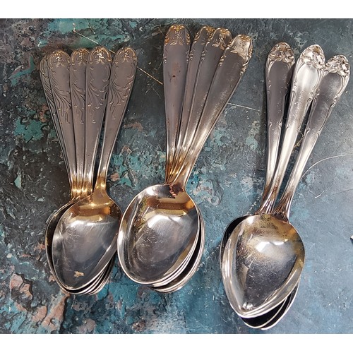 275 - World War II - three  German table spoons and nine dessert spoons, each stamped with Third Reic... 