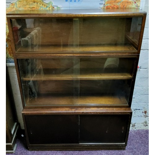 393 - An early 20th century dark mahogany Globe Wernicke type stacking bookcase cabinet of sectional form ... 