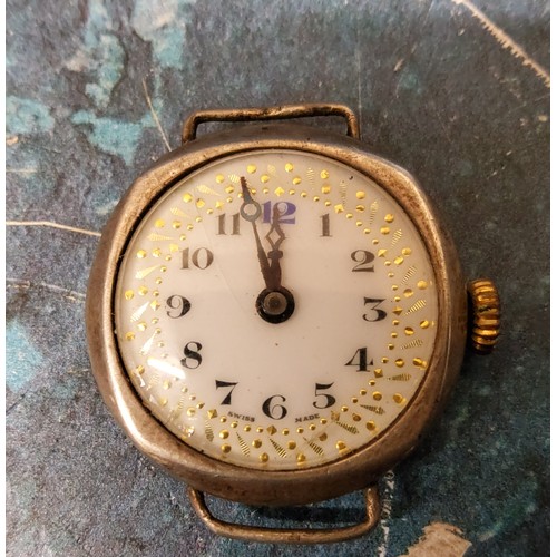 238 - An early 20th century trench form wristwatch