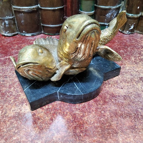 536 - An unusual bronze desk weight, Pisces, cast with two gilt bronze fish, shaped marble base, 18cm wide