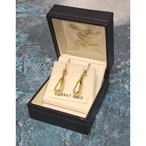 294 - A pair of 9ct gold faux pearl drop earrings