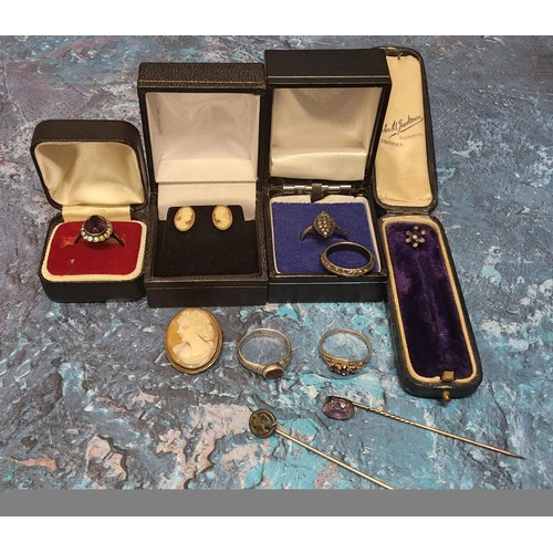 378 - A yellow metal mounted cameo; a pair of cameo earrings; a silver ring set with a central oval purple... 