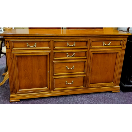 551 - A substantial reproduction Italian sideboard by SELVA, ribbon tied swag drop handles, three drawers ... 