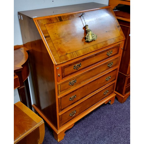 558 - A 20th century yew fall front bureau, with four graduated cockbeaded drawers, bracket feet, 100cm hi... 