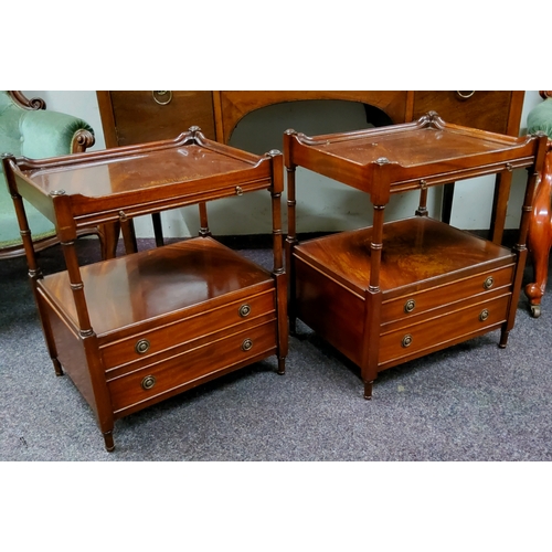 569 - A pair of reproduction mahogany bedside cabinets, the dished top raised by turned supports with slid... 