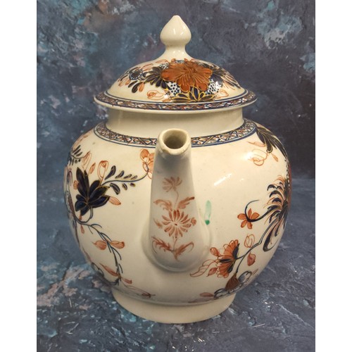 166 - A Liverpool globular Bird on a Branch pattern  teapot and cover,  painted in underglaze blue painted... 