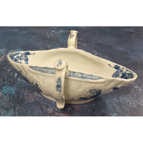 230 - A Worcester double handled sauceboat, lobed and moulded, painted with the Two-Handled Sauceboat Land... 