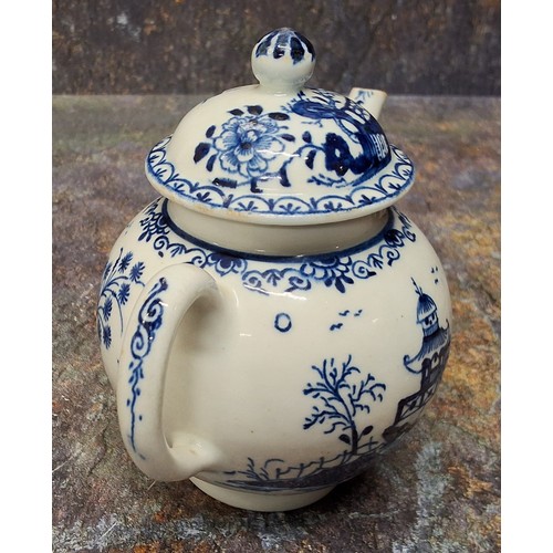 169 - A Lowestoft teapot and cover,  painted in underglazed blue with pagoda and fence, ball finial, 12.5c... 