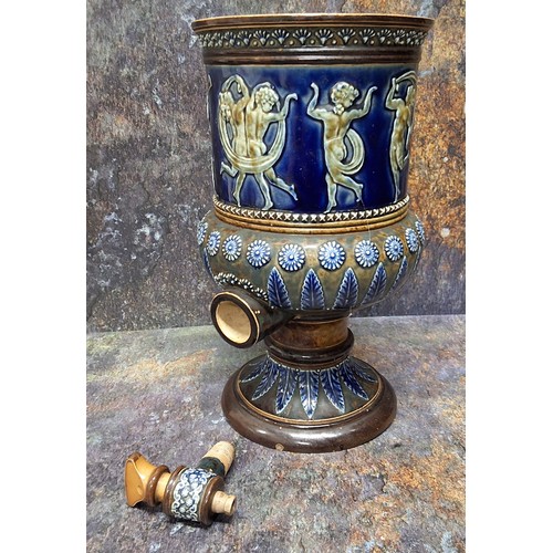 164 - A Doulton Lambeth stoneware water filter, in relief with dancing cherubs, the base with stiff leaves... 