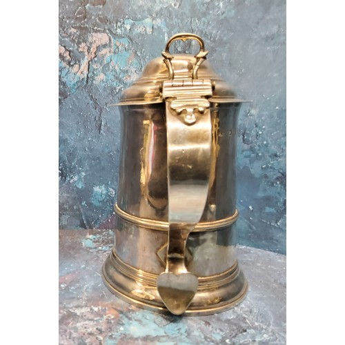 36 - A George II silver spreading cylindrical tankard, hinged domed cover, scroll handle with heart termi... 