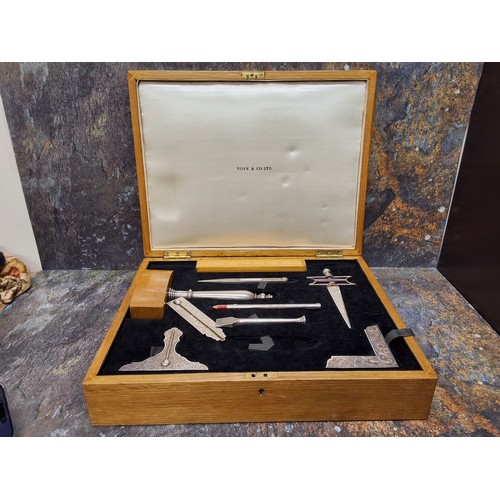 468 - A silver plated Masonic Lodge tool set, by Toyne & Co, comprising various tools, ruler,  gavel, ... 