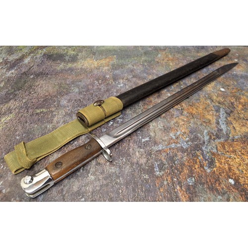 616 - World War I, a British Pattern 1907 bayonet,  42cm fullered steel blade, two-piece wooden grip, leat... 