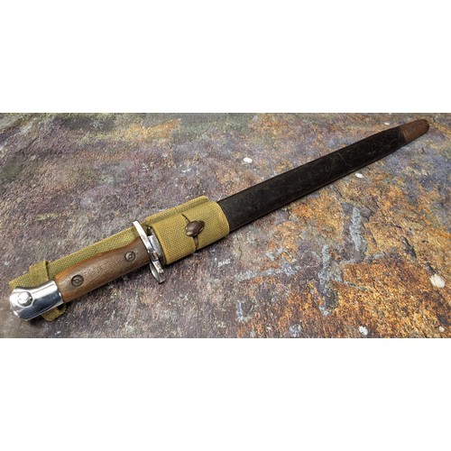 616 - World War I, a British Pattern 1907 bayonet,  42cm fullered steel blade, two-piece wooden grip, leat... 