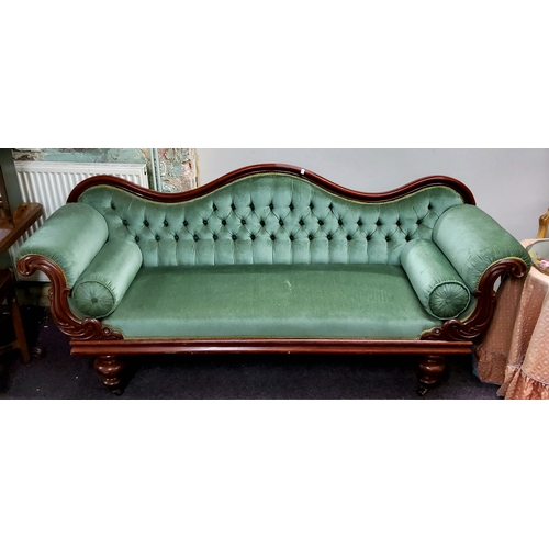 623 - A Victorian mahogany lyre-arm sofa, serpentine back, stuffed-over upholstery, turned legs, castors, ... 