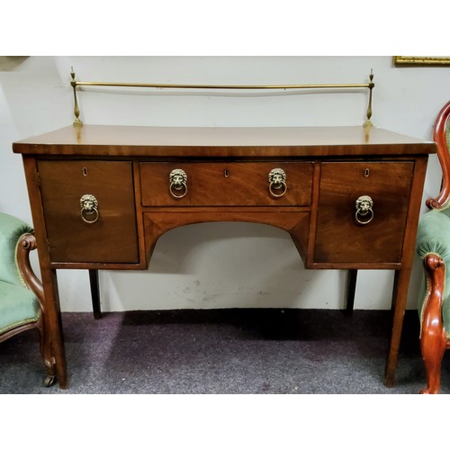 624 - A George III mahogany sideboard, brass gallery above  long drawer flanked by deep drawer and cupboar... 