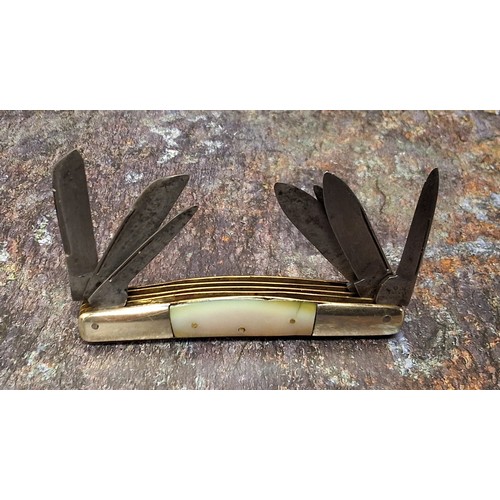 629 - A pocket knife, by Charles Shamrock, eight blades, nickel silver bolsters, mother-of-pearl scales, b... 