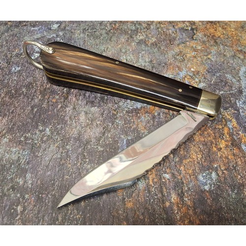 631 - A Stan Shaw blade lock knife, polished buffalo scales, vacant cartouche, work back to spring and bla... 