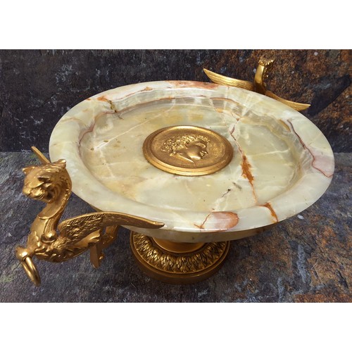 499 - An Italian onyx and gilt bronzed comport/tazza, the centre set with roundel in relief with Roman, wi... 