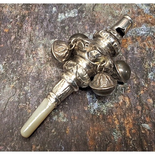 143 - A 19th century silver child's rattle, chased with flowers and scrolling foliage, whistle terminal, f... 