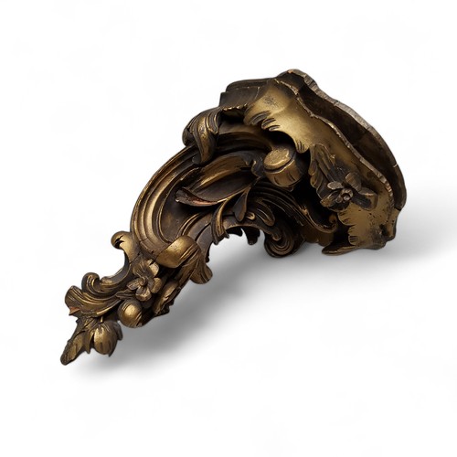 708 - An 18th century Rococo carved and gilded softwood wall sconce, 27cm high, 17cm wide x 20cm depth c.1... 