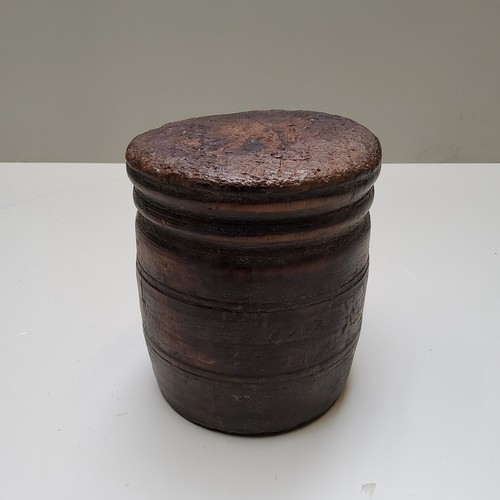 709 - A small 18th century softwood dug-out one-piece treen vessel, one piece with ribbed details c.1750, ... 