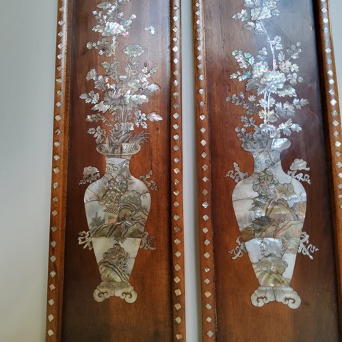 529 - Oriental Art - A pair of Chinese mother of pearl inlaid padouk wood panels, 83cm high, 16cm wide