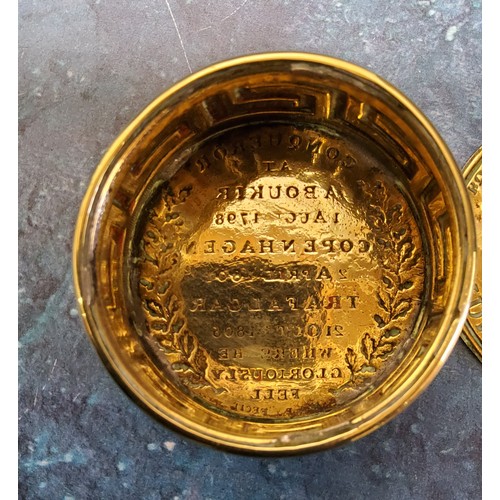 541 - Naval History - a 19th century gilt brass medallic snuff box, the cover embossed bust of Admiral Lor... 