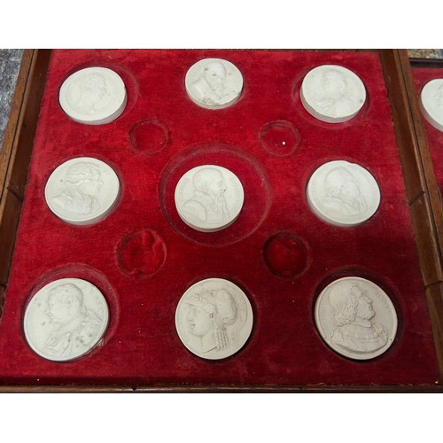 544 - Twenty-one circular plaster intaglios, of kings, noble men and painters, each approx 4cm diam, fitte... 