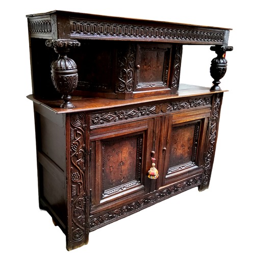 751 - A scarce mid 17th century English oak marquetry court cupboard, Elizabethan style, Leeds Area, Yorks... 