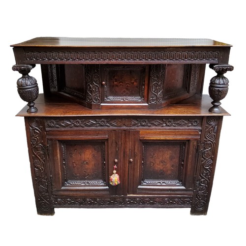 751 - A scarce mid 17th century English oak marquetry court cupboard, Elizabethan style, Leeds Area, Yorks... 