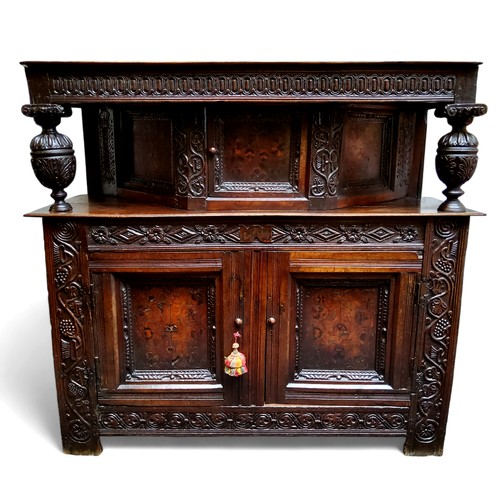 751 - A scarce mid 17th century English oak marquetry court cupboard, Elizabethan style, Leeds Area, Yorks... 